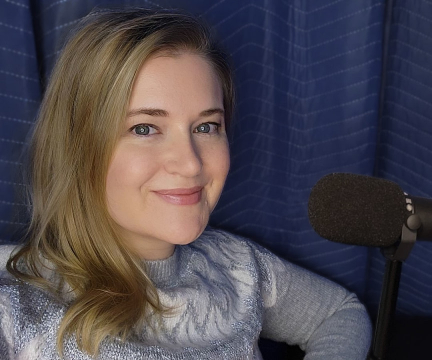 Jaimie Paulson wearing a cool Fair Isle sweater in her recording booth